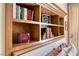 This headboard has built in bookshelves with decorative accents at 2734 Grand Forks Rd, Henderson, NV 89052
