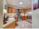 Bright kitchen featuring updated appliances, ample cabinet space, and a convenient layout at 2734 Grand Forks Rd, Henderson, NV 89052