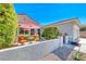 Cozy front patio with seating area, perfect for relaxing and enjoying the outdoors at 2734 Grand Forks Rd, Henderson, NV 89052