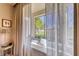 A window nook featuring large bright windows with sheer curtains at 2734 Grand Forks Rd, Henderson, NV 89052