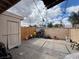 Enclosed backyard with a concrete patio and a mix of storage and open space at 2804 Marlin Ave, Las Vegas, NV 89101