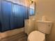 Well-maintained bathroom with a toilet, vanity, and shower at 2804 Marlin Ave, Las Vegas, NV 89101