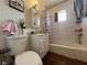 The interior bathroom features a tiled shower over tub, a single sink, and vinyl flooring at 2804 Marlin Ave, Las Vegas, NV 89101