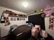 Inviting bedroom with a comfortable bed, shelf decor, and curtains at 2804 Marlin Ave, Las Vegas, NV 89101