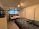 Cozy bedroom featuring a comfortable bed, closet, and plenty of natural light at 2804 Marlin Ave, Las Vegas, NV 89101