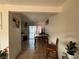 A bright dining area with a wooden table set for meals and an adjacent kitchen at 2804 Marlin Ave, Las Vegas, NV 89101