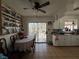 Cozy dining room featuring tiled flooring, dining table, and a plate rack display at 2804 Marlin Ave, Las Vegas, NV 89101