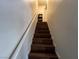 The interior features a wooden staircase with white trim and a handrail at 2804 Marlin Ave, Las Vegas, NV 89101