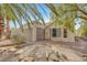 View of the backyard featuring landscaping, privacy and outdoor living at 2920 Crown Ridge Dr, Las Vegas, NV 89134