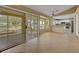 Open floorplan to the kitchen featuring tile floors, stainless appliances, and natural light at 2920 Crown Ridge Dr, Las Vegas, NV 89134