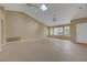 Bright living room featuring vaulted ceilings, neutral walls, tile floors and recessed lighting at 2920 Crown Ridge Dr, Las Vegas, NV 89134