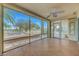 Screened in patio with views of landscaping, golf course and blue sky at 2920 Crown Ridge Dr, Las Vegas, NV 89134