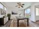 Bright dining room with a sliding glass door for backyard access and natural light at 306 Saint Augustine Ln, Henderson, NV 89014