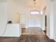 Bright foyer featuring elegant tile flooring, high ceilings, and a decorative light fixture at 306 Saint Augustine Ln, Henderson, NV 89014