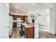 Charming kitchen features granite counters and an open layout connecting to the living space at 306 Saint Augustine Ln, Henderson, NV 89014