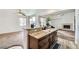 Open kitchen with a peninsula island and seamless flow to the cozy living room at 306 Saint Augustine Ln, Henderson, NV 89014