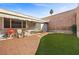 Inviting backyard featuring patio and low-maintenance landscaping perfect for outdoor entertaining at 3323 Maclyon Way, Las Vegas, NV 89121