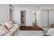 Bedroom showcasing closet space and a cozy sitting area, perfect for relaxation and storage at 3323 Maclyon Way, Las Vegas, NV 89121