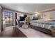 Bedroom with ample natural light, a comfortable chair, and a welcoming entryway at 3323 Maclyon Way, Las Vegas, NV 89121