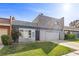 Charming two-story home offers a well-maintained lawn and two car garage for plenty of parking at 3323 Maclyon Way, Las Vegas, NV 89121