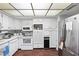 Charming kitchen with abundant white cabinets, modern appliances, and plenty of counter space at 3323 Maclyon Way, Las Vegas, NV 89121