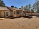 Exterior of home with gravel landscaping and a covered patio at 3619 Edinburgh Dr, Las Vegas, NV 89103
