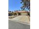 Inviting home showcasing a two-car garage and landscaped front yard with rock features at 3619 Edinburgh Dr, Las Vegas, NV 89103