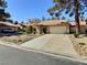 Charming single-story home with a two-car garage and a well-maintained front yard at 3619 Edinburgh Dr, Las Vegas, NV 89103