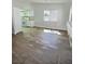 Open living room features wood floors and lots of natural light at 3619 Edinburgh Dr, Las Vegas, NV 89103