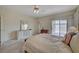 Bright bedroom with carpet, a sliding glass door to the patio, and a large dresser at 364 Wild Plum Ln, Las Vegas, NV 89107