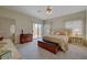 Cozy bedroom with carpeted floors, a sliding glass door, and a view of the outdoor space at 364 Wild Plum Ln, Las Vegas, NV 89107