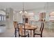 Dining area with mirrored wall and easy access to the updated kitchen at 364 Wild Plum Ln, Las Vegas, NV 89107