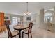Bright dining area with easy access to the living room and foyer at 364 Wild Plum Ln, Las Vegas, NV 89107