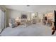 Inviting living room featuring neutral tones, large windows, and an open layout at 364 Wild Plum Ln, Las Vegas, NV 89107