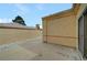 Home exterior featuring a block wall fence and low-maintenance desert landscaping at 364 Wild Plum Ln, Las Vegas, NV 89107