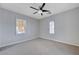 Bedroom featuring plush neutral carpet and a ceiling fan at 3663 Coventry Gardens Dr, Las Vegas, NV 89135