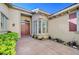 Welcoming home entrance featuring a double door with sidelights and landscaped garden, providing a warm, inviting feel at 3663 Coventry Gardens Dr, Las Vegas, NV 89135