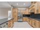 Contemporary kitchen offers stainless steel appliances, ample cabinet space, and island at 3663 Coventry Gardens Dr, Las Vegas, NV 89135