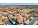 Expansive view of the community showcasing multi-Gathering units, covered parking, and lush landscaping at 3920 Legend Hills St # 202, Las Vegas, NV 89129