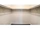 Spacious walk-in closet features white walls, dark baseboards and hardwood floors at 3920 Legend Hills St # 202, Las Vegas, NV 89129