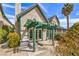 Charming home backyard with a wooden pergola and french doors at 4043 Chalfont Ct, Las Vegas, NV 89121