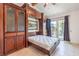 Bedroom features built-in cabinetry, a Murphy bed, and doors that lead to the outside at 4043 Chalfont Ct, Las Vegas, NV 89121