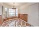 Cozy breakfast nook with tile flooring, bright windows, and a modern light fixture at 4043 Chalfont Ct, Las Vegas, NV 89121