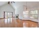 Bright living room boasting a fireplace, hardwood floors, and vaulted ceilings at 4043 Chalfont Ct, Las Vegas, NV 89121