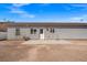 A large, low-maintenance backyard features a concrete patio and offers an opportunity for outdoor living at 4669 E Saint Louis Ave, Las Vegas, NV 89104