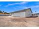 A large backyard featuring a concrete patio, the backyard provides an opportunity for outdoor living and entertaining at 4669 E Saint Louis Ave, Las Vegas, NV 89104