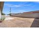 The huge backyard has ample space for entertaining with a large concrete patio and block wall for privacy at 4669 E Saint Louis Ave, Las Vegas, NV 89104