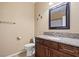 Bathroom with tile floors, granite counters, and a large mirror at 4669 E Saint Louis Ave, Las Vegas, NV 89104