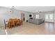 Spacious living room featuring tile flooring, a ceiling fan and neutral paint tones at 4669 E Saint Louis Ave, Las Vegas, NV 89104
