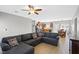 Inviting living room with open floor plan leading to a well-appointed kitchen at 4669 E Saint Louis Ave, Las Vegas, NV 89104